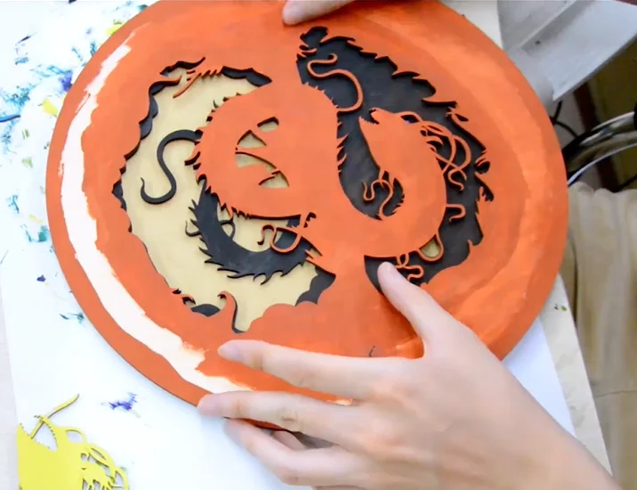 assemble multi-layered plywood dragon craft.webp
